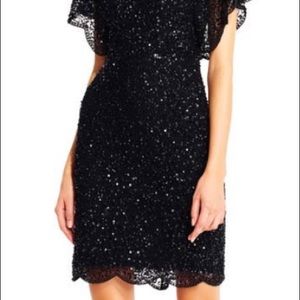 sequin beaded cocktail dress with flutter sleeves and scallop trim